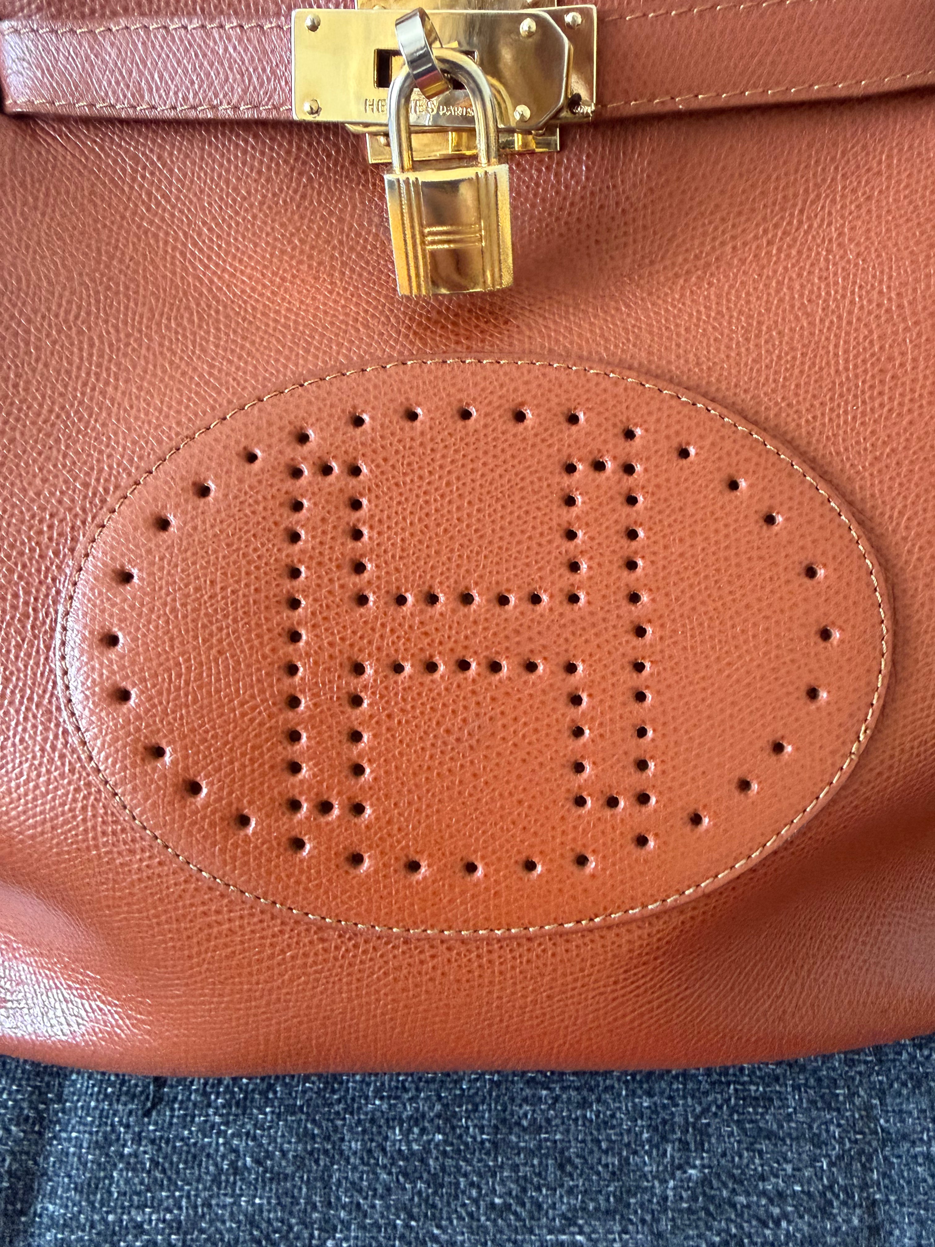 Hermès Kelly “H Perforated” Leather Bag